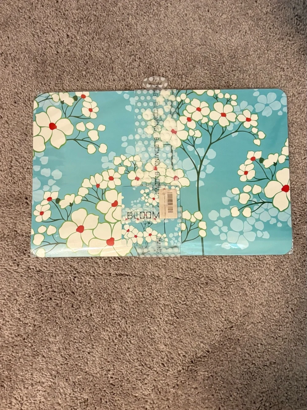 (6) New In Packaging Plastic Cherry Blossom design placemats and coasters